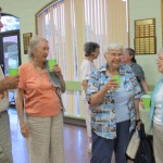Robin talking with guests